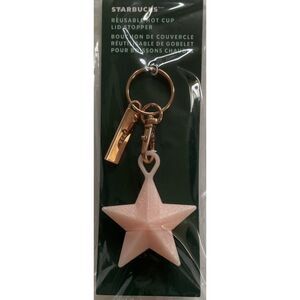 STARBUCKS Keychain Lid Stopper 2023 Holiday Pink Star Reusable Silicone Hot Cup